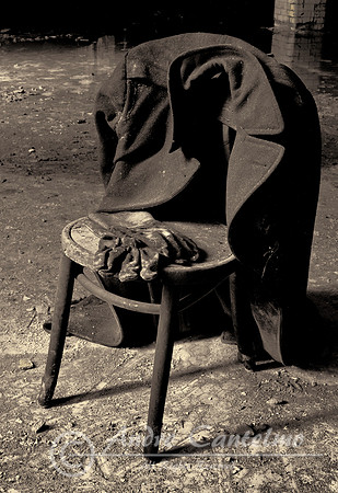 V750038_coat and gloves on a chair